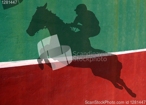 Image of Not Quite Tennis - Show jumper Silhouette Against Practice Wall