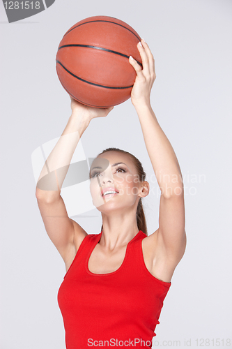 Image of Woman with basket ball