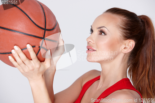 Image of Woman with basket ball