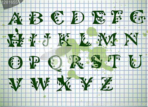 Image of hand writen green alphabet 