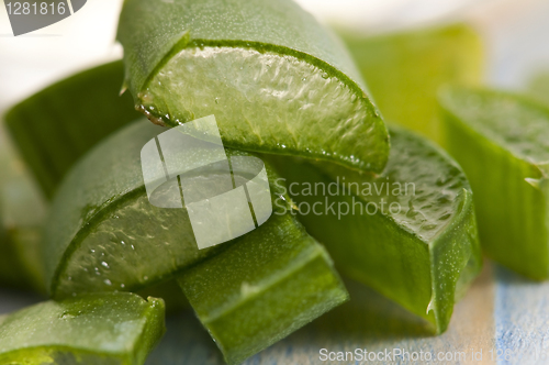 Image of aloe vera juice with fresh leaves