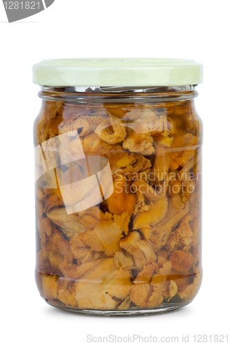 Image of Chanterelle mushrooms marinated in the glass jar