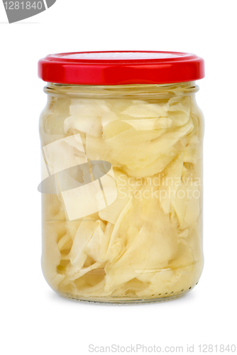 Image of Sliced ginger root marinated in the glass jar
