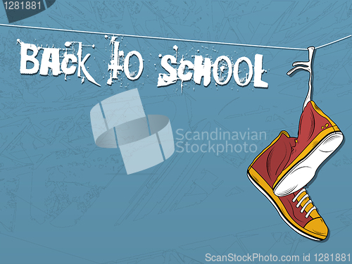 Image of Shoes hanging on wire background. Back to school