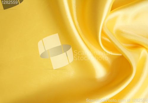 Image of Smooth elegant golden silk can use as background 