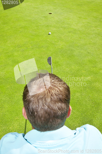 Image of golf player