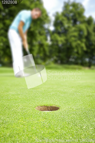 Image of golf player