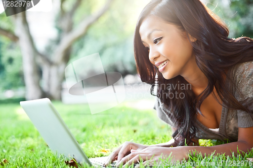 Image of Asian student on campus