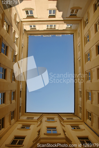 Image of Blue sky framed by building