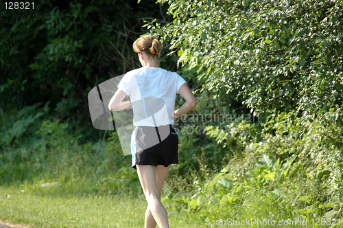 Image of Lone woman jogging