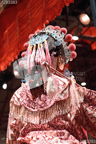 Image of chinese dummy opera, looking after the stage 