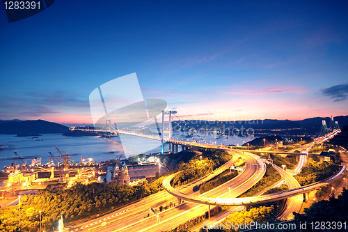 Image of traffic highway bridge at night