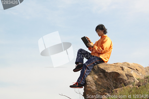 Image of man with tablet 