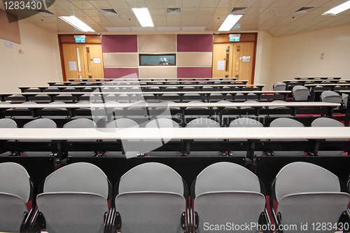 Image of Empty hall for presentation with grey armchairs 
