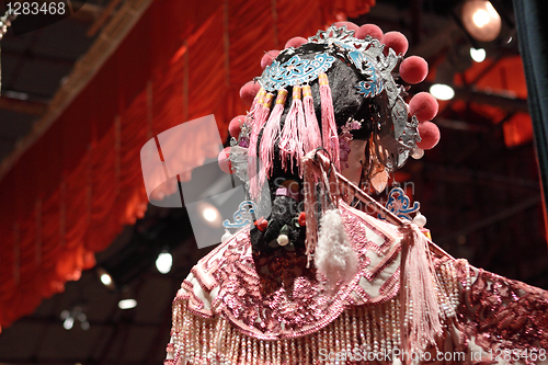 Image of chinese dummy opera, looking after the stage 