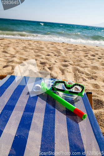 Image of Snorkel and mask on sunbed