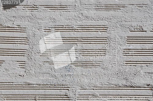 Image of Brick wall painted with a white paint 