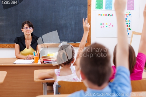 Image of Teacher and their students