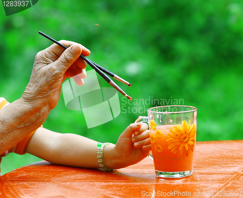 Image of Hands of young and old artists