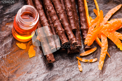 Image of chocolate sticks with orange