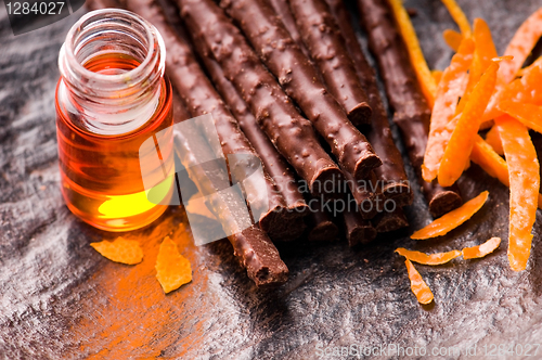 Image of chocolate sticks with orange