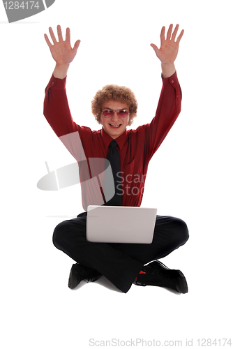 Image of Businessman sitting with Laptop

