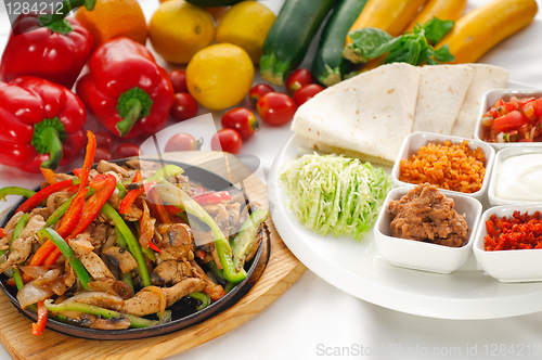 Image of original fajita sizzling hot  on iron plate