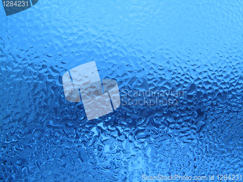 Image of natural water drops on glass