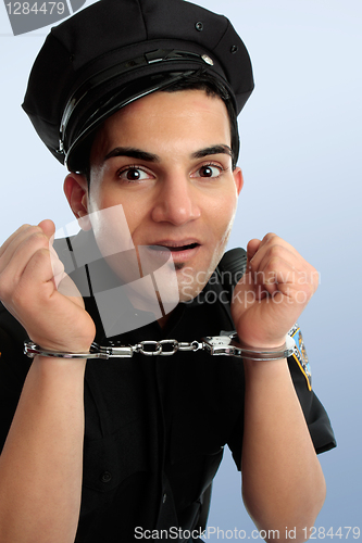 Image of Policeman with handcuffs