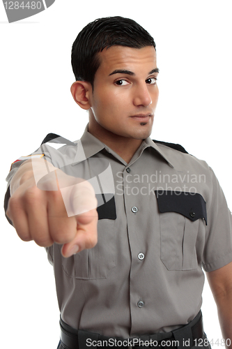 Image of Security or Prison officer pointing finger