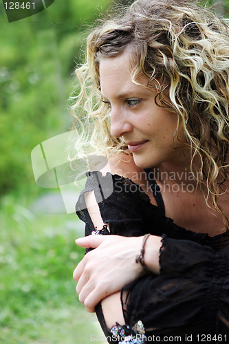 Image of Portrait of a gorgeous woman at the park