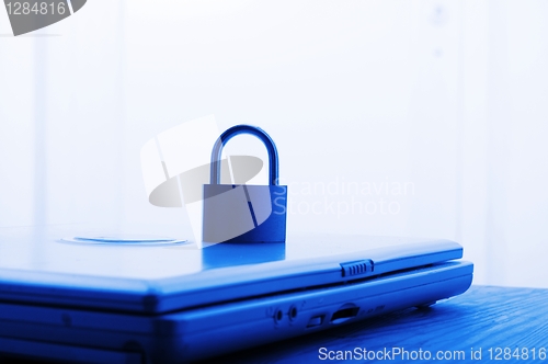 Image of notebook and padlock