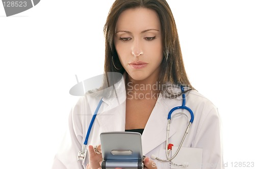 Image of Doctor referencing information on a portable device