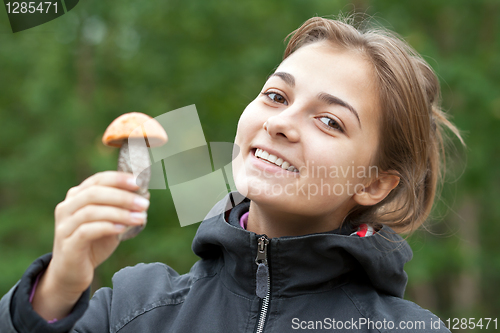 Image of portrait of a girl with a mushroom