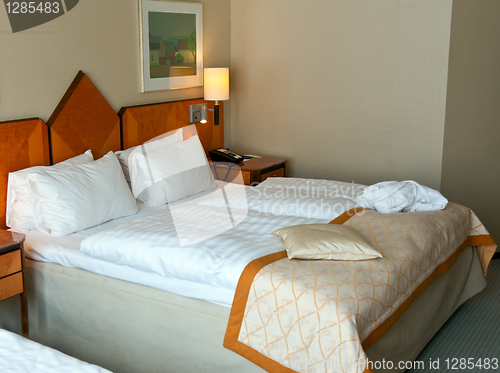 Image of bed in a hotel room