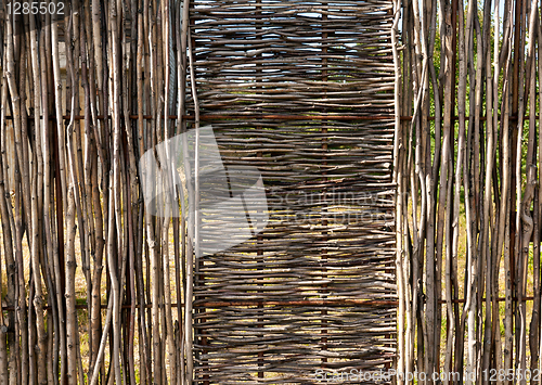 Image of woven wooden fence