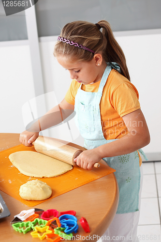 Image of Child baking cookies