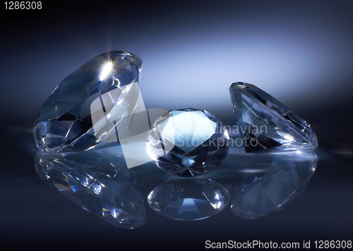 Image of Shiny diamonds jewel on dark blue