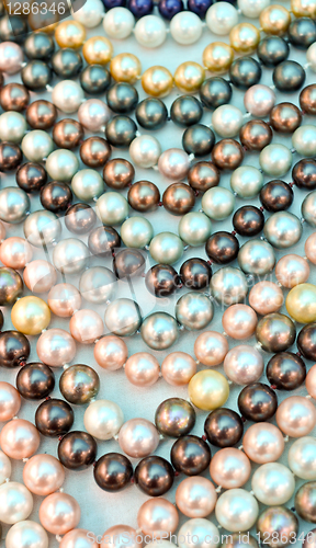Image of a lot of pearl beads close up