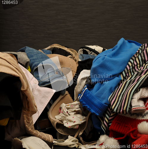 Image of Big heap of colorful clothes