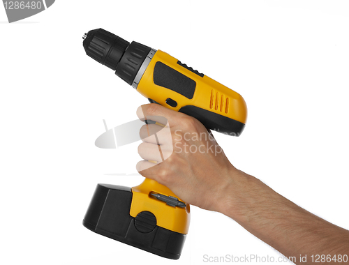 Image of Battery drill in left hand