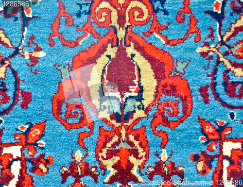 Image of colored wool handmade carpet closeup