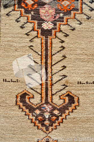 Image of colored wool handmade carpet closeup