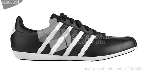 Image of Black sneaker with white strips