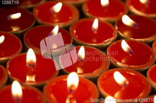 Image of candles in darkness