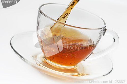 Image of Cup with tea on white background