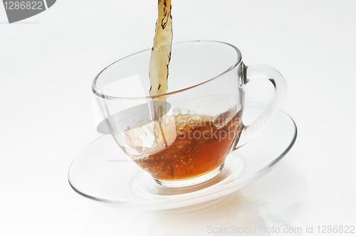 Image of Cup with tea on white background