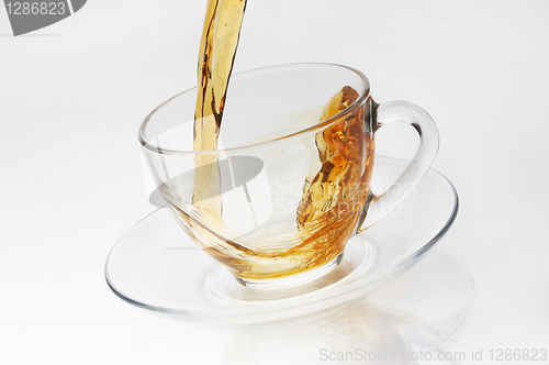 Image of Cup with tea on white background