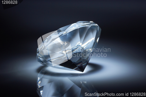 Image of Diamond jewel on dark blue