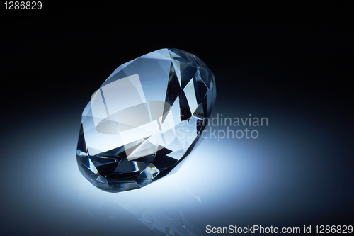 Image of Diamond jewel on dark blue